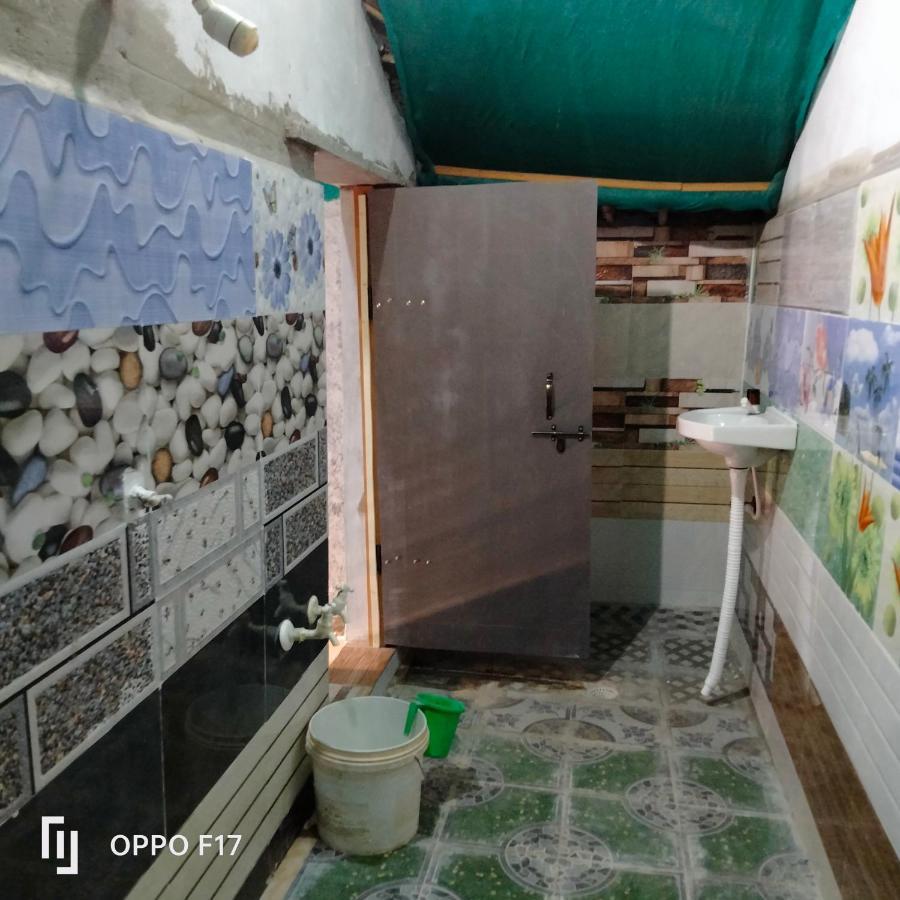 Goldengarden Cottages Hampi Rom bilde