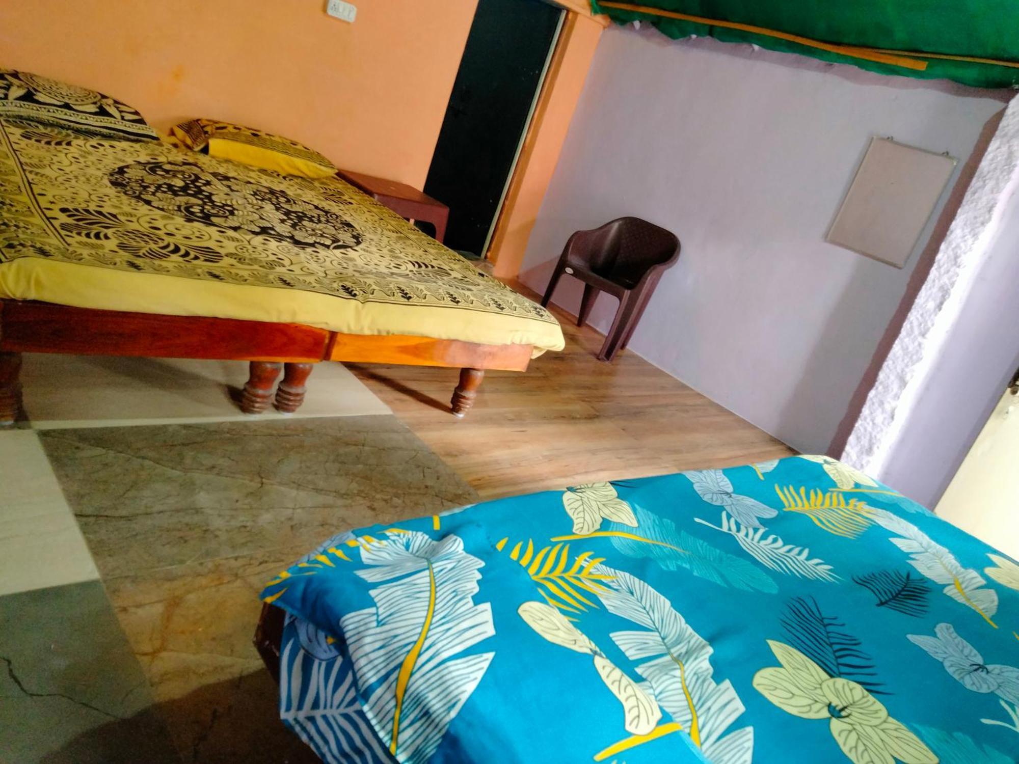 Goldengarden Cottages Hampi Rom bilde