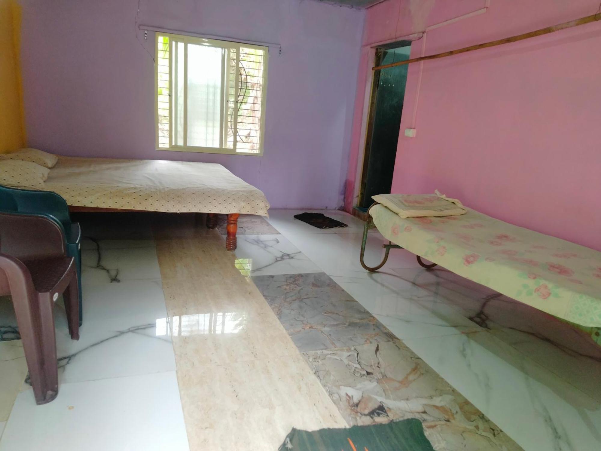 Goldengarden Cottages Hampi Rom bilde