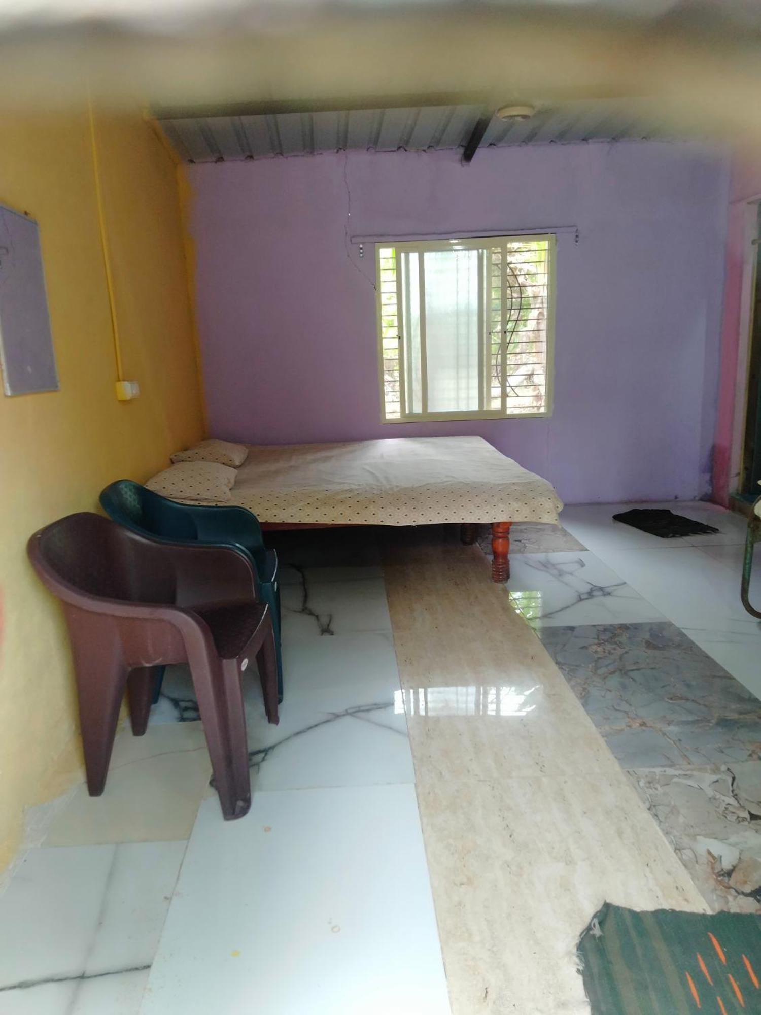 Goldengarden Cottages Hampi Rom bilde